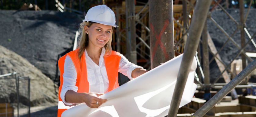 hiring a 1099 subcontractor agreement woman holding blueprints