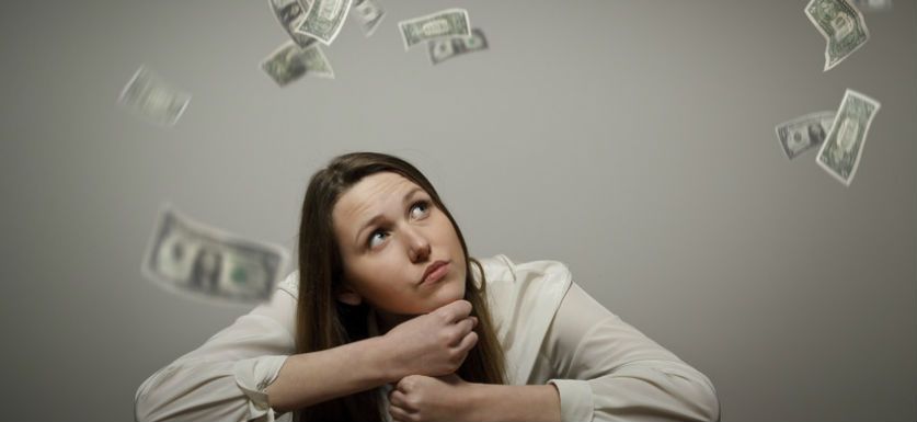 Picture of woman pondering fsa refund wanting to find out what you can do with forfeited FSA funds.