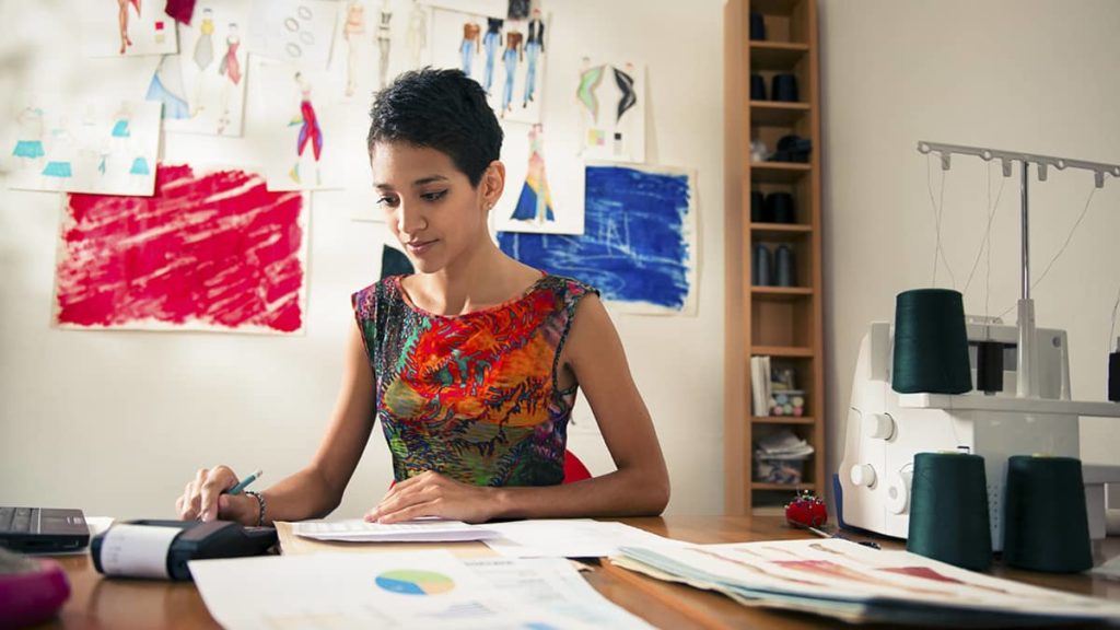 woman working on accounting tasks at her small business