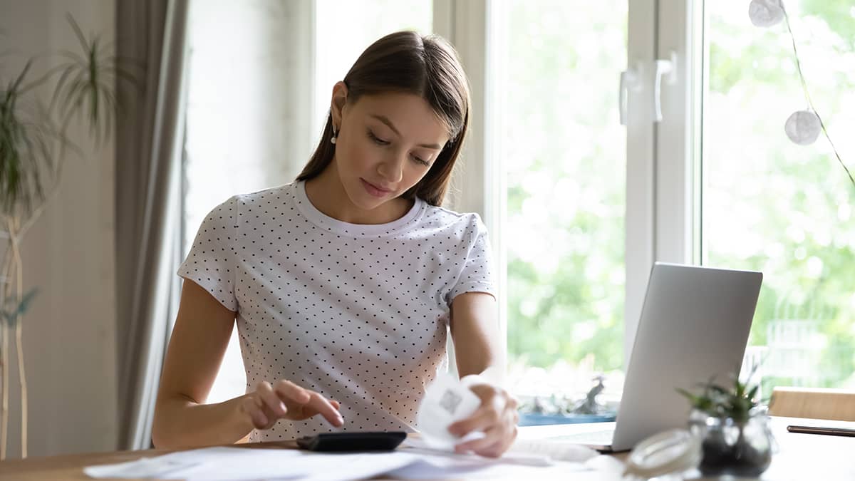 woman learning what are the payroll taxes paid by employers