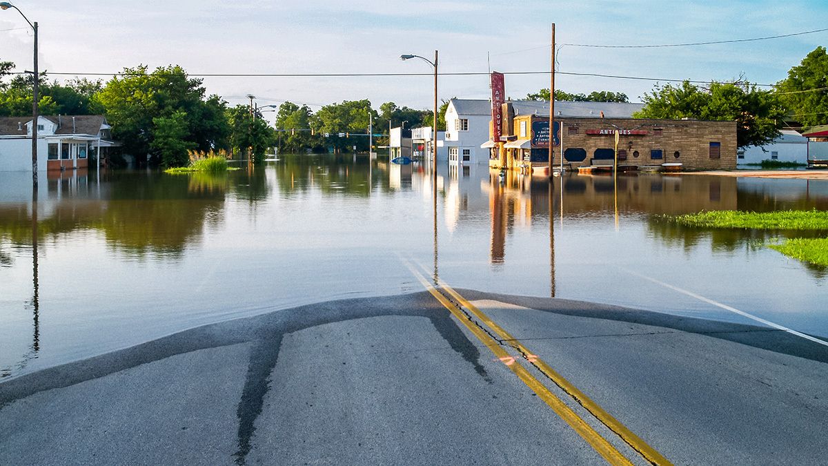 flooded road and town